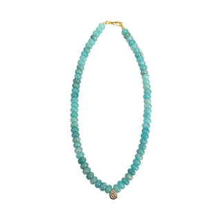 A beaded necklace made of faceted light blue-green beads with a small gold teardrop charm and gold clasp, shown on a plain white background.