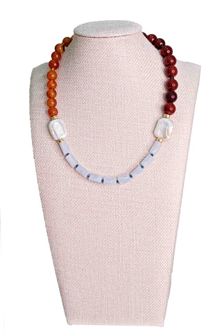 Knotty Bling amber tricolor necklace featuring amber, carnelian and blue lace agate stones with white pearl accents and gold spacer beads in mixed stone design