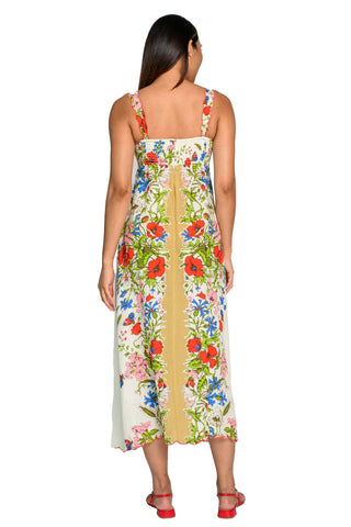 Woman wearing a floral dress on a white background