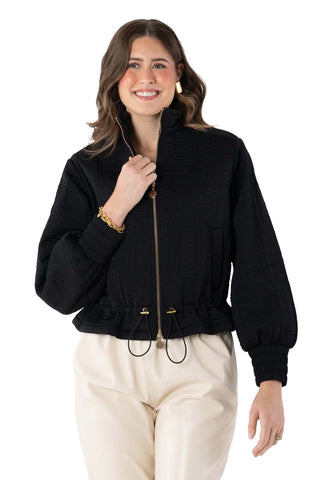 
Emily McCarthy Bailey Bomber Jacket in Tap Shoe black featuring stand collar, blouson sleeves, two-way zipper and adjustable peplum hem with cord tie
