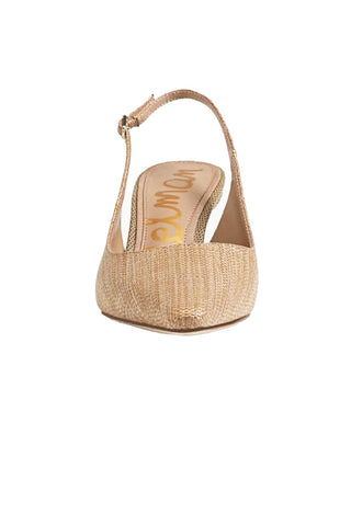 Beige sandal with raffia sole on a white background