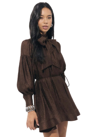 Adelyn Rae Daphne Mini Dress in Chocolate Brown. chocolate brown mini dress with oversized neck bow, balloon sleeves, and belted waist in shimmer fabric