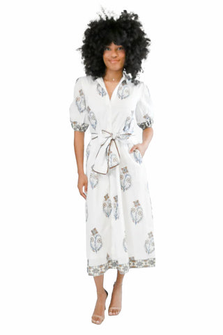 Victoria Dunn Eden Dress in Golden Dawn. White wrap dress with blue and gold floral print featuring three-quarter sleeves and midi length