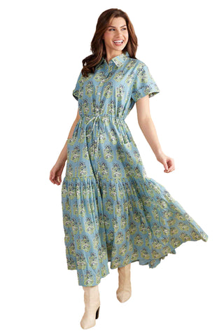 light blue midi dress with green and cream paisley print, featuring short sleeves, button front, tie waist, and tiered ruffle hem