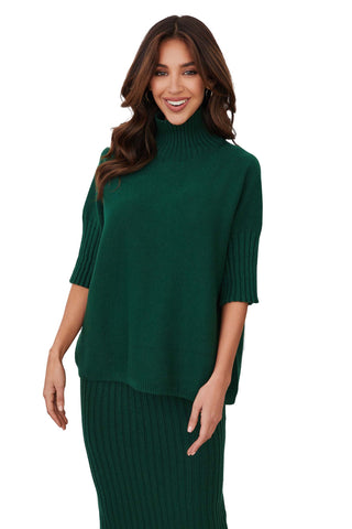 Milio Milano Rib Contrast Turtleneck in Hunter Green. Hunter green oversized turtleneck sweater with ribbed collar, cuffs, and hem