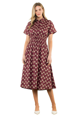 THML Short Sleeve Print Midi Dress in Maroon. Maroon midi dress with cream floral print, featuring short sleeves, high neckline, cinched waist with tie detail, and A-line skirt