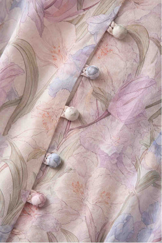 Close-up of a floral patterned fabric with buttons.