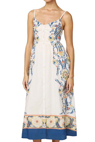 Cleobella Tamasin midi dress with sweetheart neckline, button-front closure, adjustable straps, side smocking detail, and bold border print pattern in flowing midi length silhouette