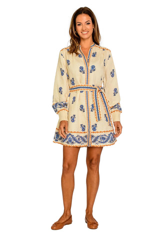 cream mini dress with blue floral embroidery, long sleeves, tie waist belt, and ornate border trim in bohemian style. Elizabeth James Tara Dress in Handkerchief Ivory