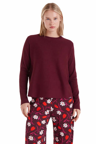 The Olivia sweater in aubergine purple featuring crew neck design, long sleeves and relaxed fit knit construction for comfortable layering