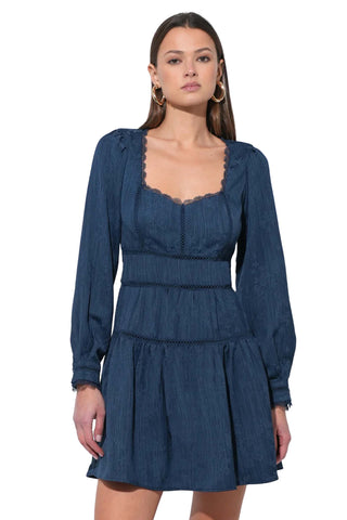 Adelyn Rae Twilla mini dress in navy featuring sweetheart neckline, long billowy sleeves, lace trim details and tiered skirt with empire waist