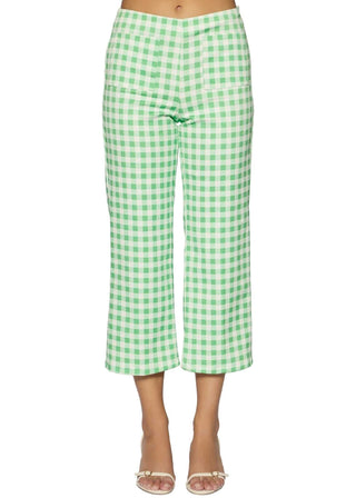 Green and white checkered pants on a plain background