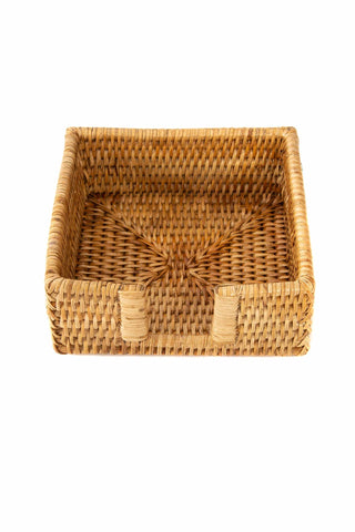 Hand-woven rattan cocktail napkin holder with tight weave construction available in honey brown for elegant cocktail napkin storage