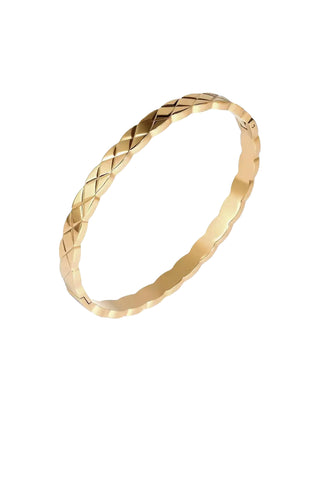 Gold bangle bracelet with quilted diamond pattern texture 