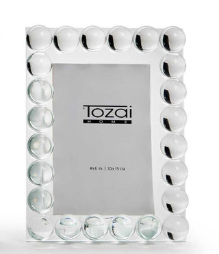Decorative picture frame with bubble design and Tozai Home branding