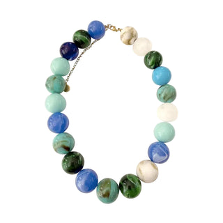 Multicolored beaded bracelet on a white background