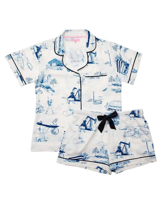 White pajama set with blue nautical patterns on a white background