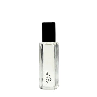 A clear glass perfume bottle with a black cap, featuring the brand name 'muse' printed vertically on the front, set against a plain white background.
