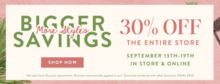 A promotional sale banner with a cream background and pink floral border. Large green text reads 'BIGGER SAVINGS' with smaller pink script 'More styles,' alongside '30% OFF THE ENTIRE STORE,' dates 'SEPTEMBER 13TH-19TH,' and 'SHOP NOW' in a dusty pink box.